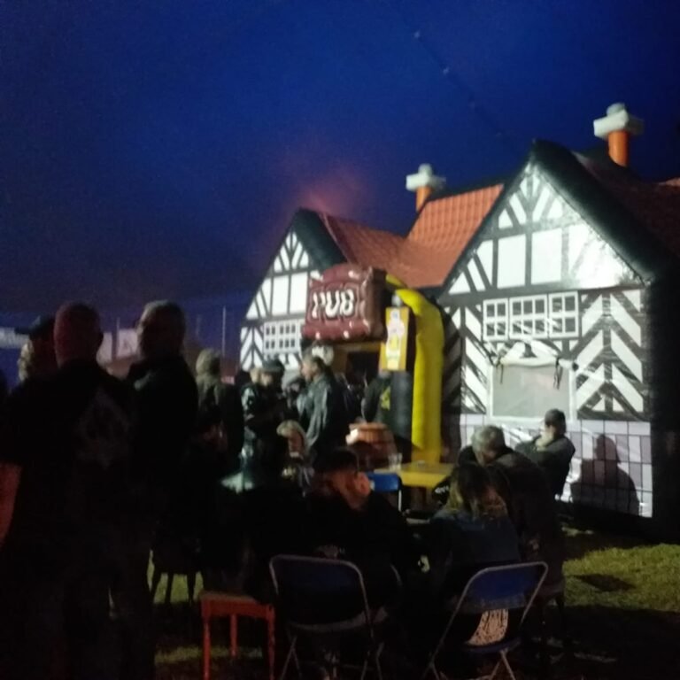 Inflatable pub exterior with wooden-style design