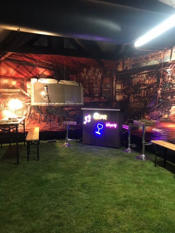 Party guests inside inflatable pub South West