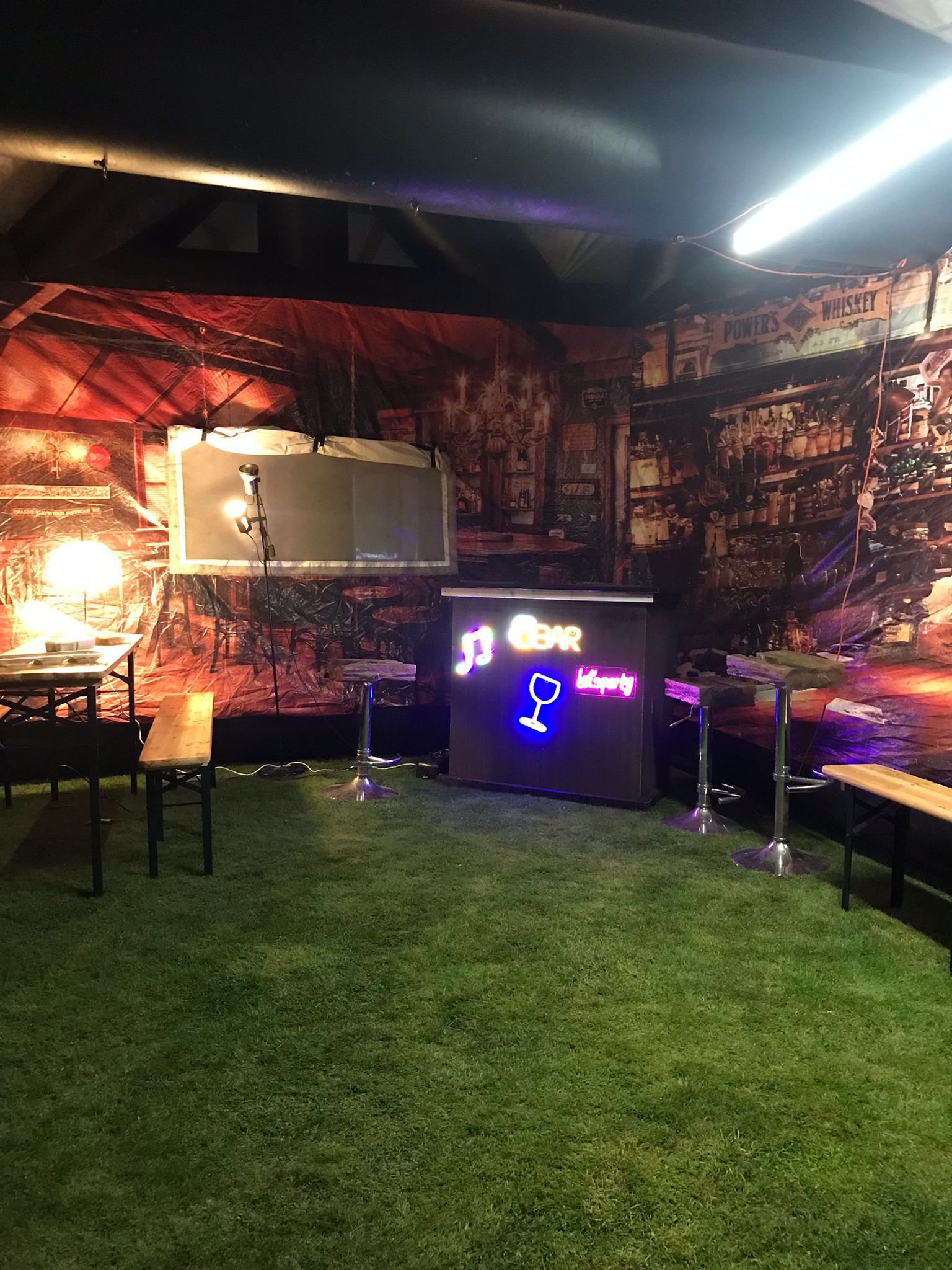 Party guests inside inflatable pub South West